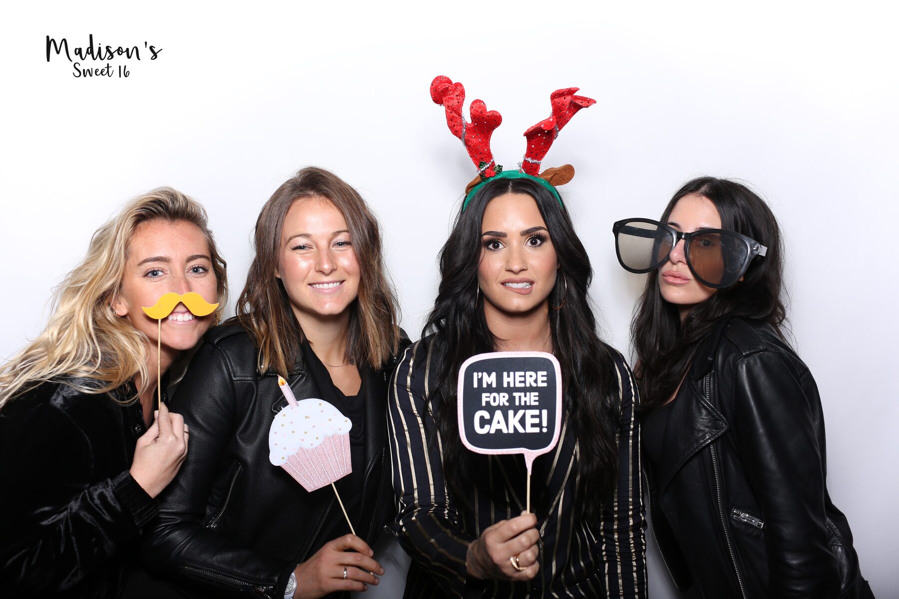 Guests creating a photo booth memory