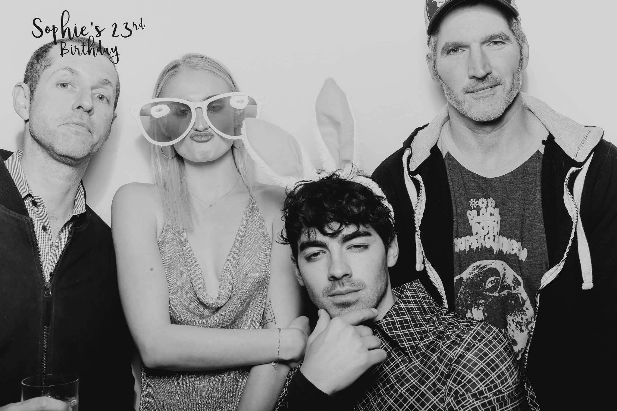 Friends having fun together at a photo booth